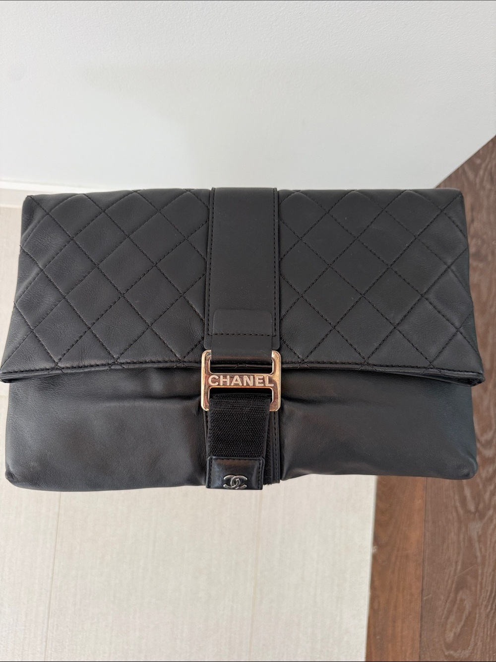 CHANEL Black Quilted Leather Messenger Fold-Over Bag with Gold Hardware